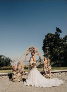 Bride poses at the Arbor.