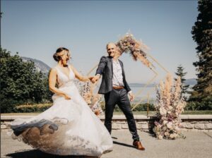 A bride and groom dancing on the Villa grounds.